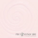 Texture vernis semi-permanent Mathilde NGV104. Couleur rose milky vaporeux et onctueux au fini crème.