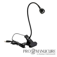 Mini lampe LED noire ProManucure avec pince et col de cygne flexible pour pose de capsules américaines.